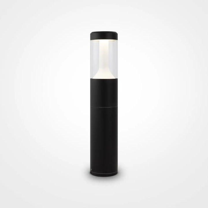 Borne extérieure koln cylindrique en acier noir avec lumière claire led dans un top en verre transparent