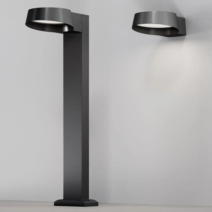 Borne extérieure led noire en métal moderne avec un luminaire circulaire incurvé pour éclairage extérieur design