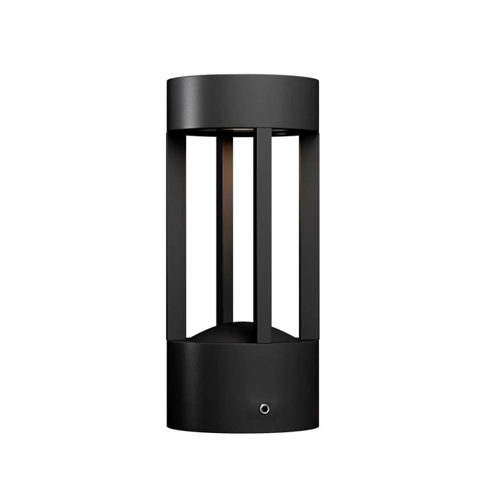 Borne extérieure led cylindrique noire en métal avec indice ip65 et lumière douce pour extérieur moderne