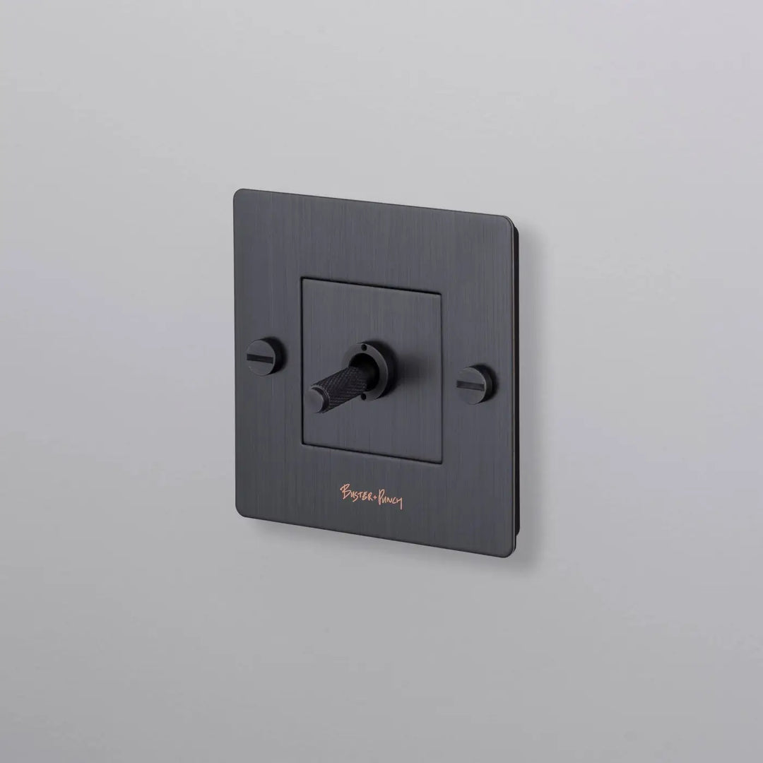 Interrupteur à levier Toggle à gravure quadrillée bronze fumé #couleur_gris
