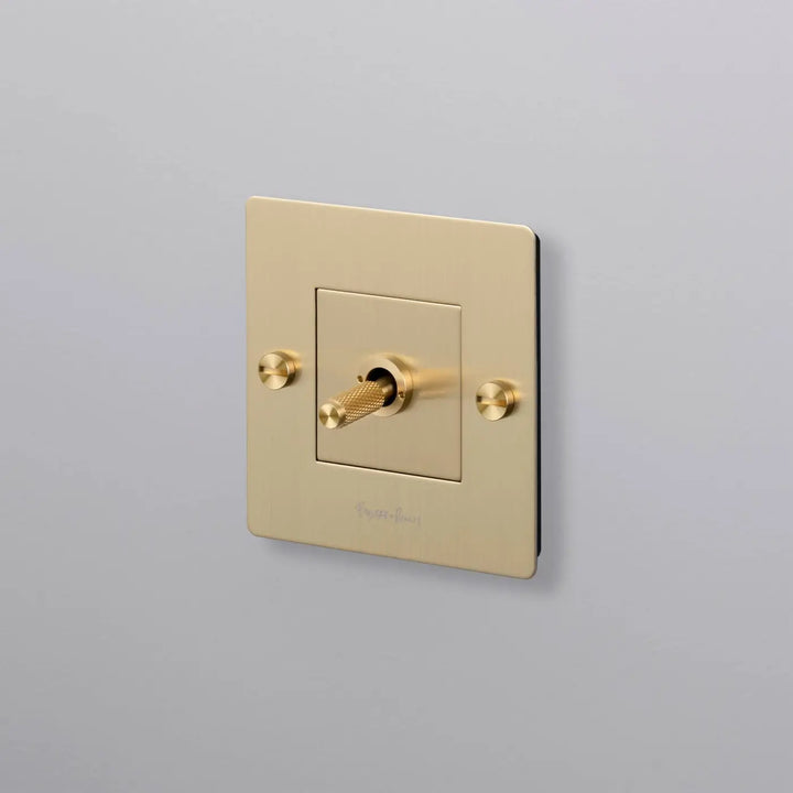 Interrupteur à levier Toggle à gravure quadrillée doré, finition laiton #couleur_dor