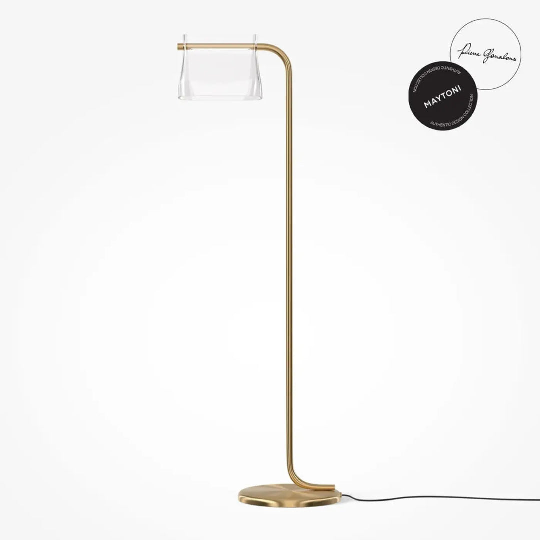 Lampadaire cabaret art déco avec finition dorée, pied courbé minimaliste et abat-jour en verre transparent