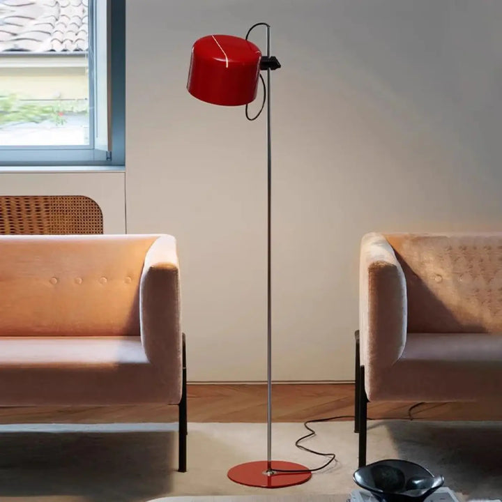 Lampadaire zelto rouge cylindrique avec pied métallique élégant et base circulaire assortie pour un éclairage moderne
