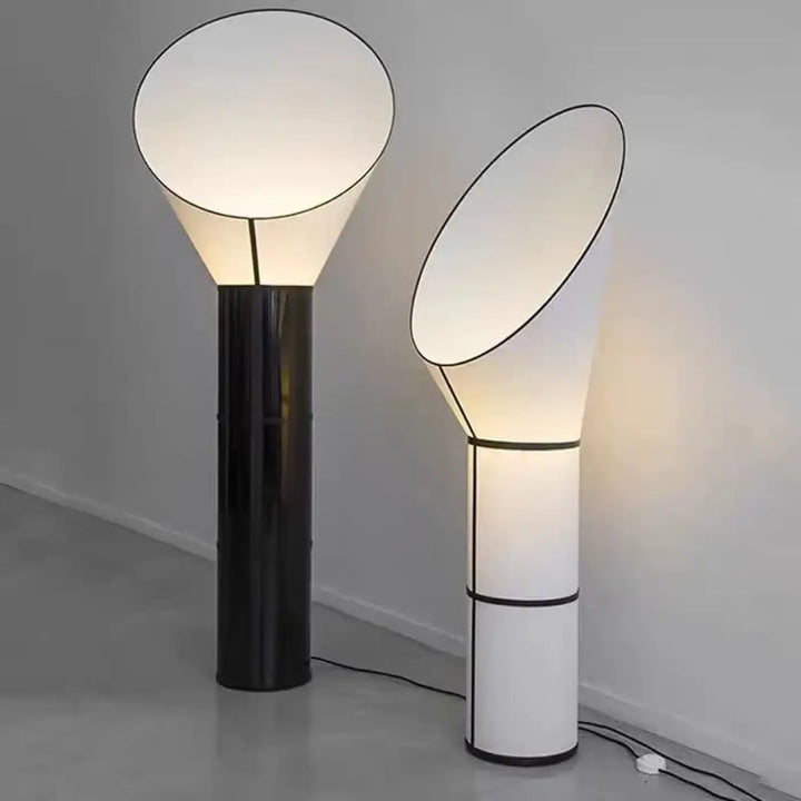 Lampadaire aloris avec base cylindrique moderne et lumière douce sous abat-jours blancs contours noirs design moderne