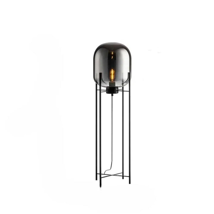 Lampadaire vito avec globe en verre fumé et ampoule à filament sur cadre métal noir minimaliste effet abat-jour ambre