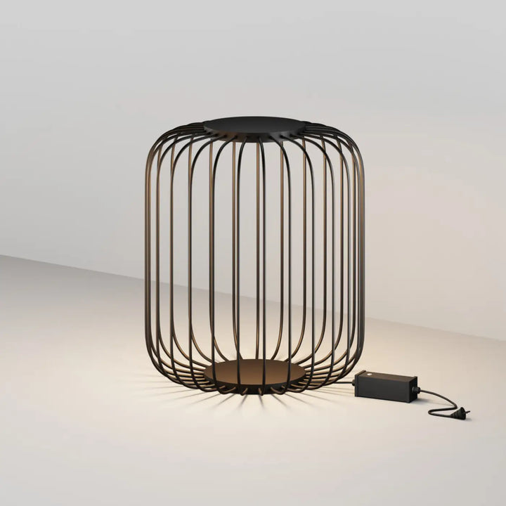 Lampadaire extérieur led en fil d’acier noir avec structure ajourée et plaques circulaires en haut et en bas