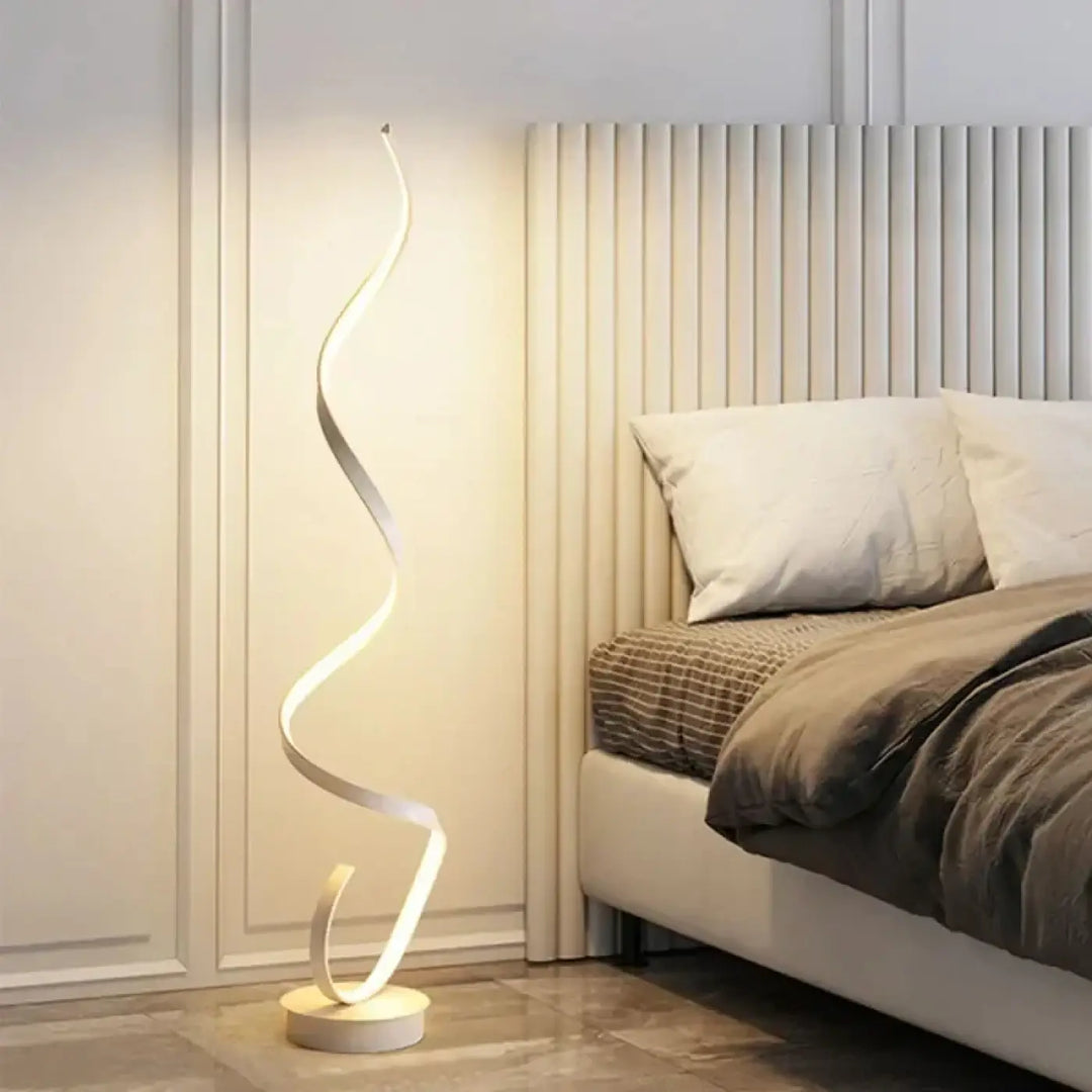 Lampadaire led spiry avec design ondulé blanc et éclairage ambiant chaud pour intérieur moderne