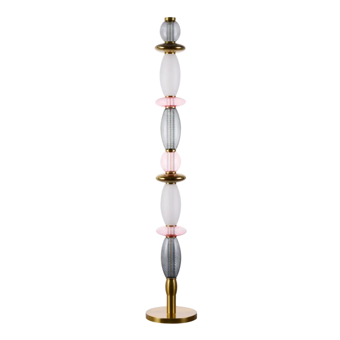 Lampadaire léonor avec segments en verre soufflé translucide blancs et gris et finitions en métal rose doré savoir-faire artisanal