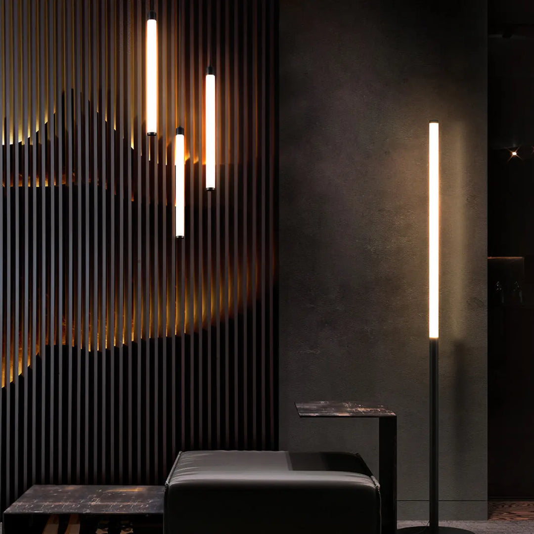 Lampadaire ray tube lumineux en acier noir avec design cylindrique moderne et éclairage d ambiance chaleureux