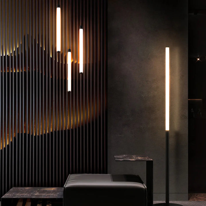 Lampadaire ray tube lumineux en acier noir avec design cylindrique moderne et éclairage d ambiance chaleureux
