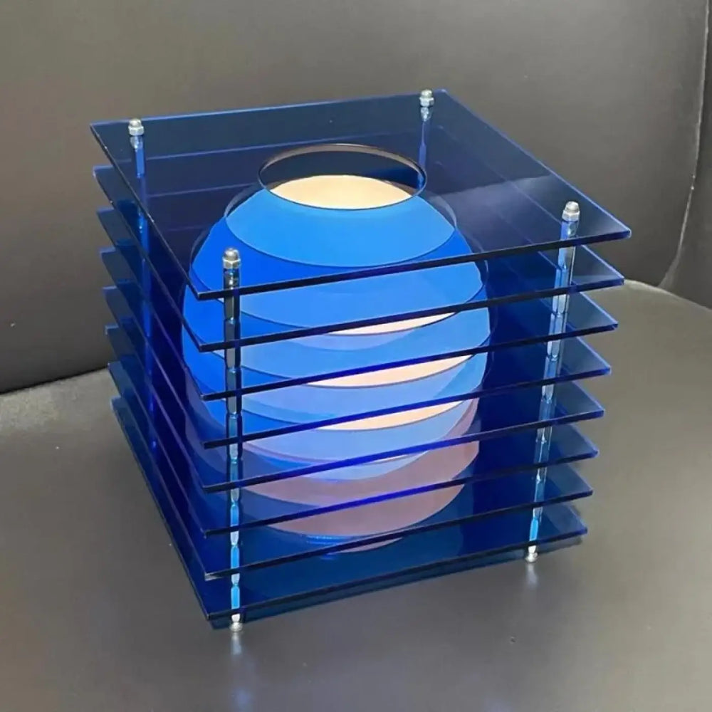 Lampe de chevet cubis sphère lumineuse en acrylique bleu translucide avec design chevet cube univers déco