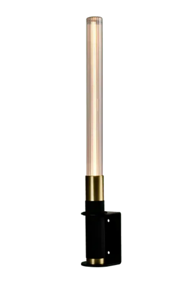 Lampe de chevet hélios avec objet lumineux en verre transparent et base noire, anneaux metal dore, design moderne