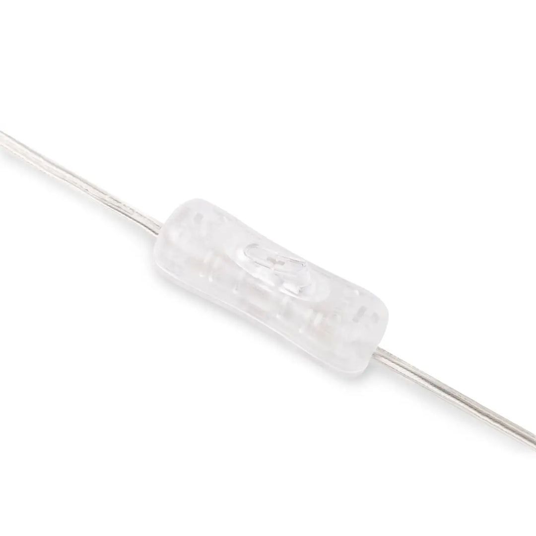 Clear toggle switch en plastique transparent avec surface texturée et composants internes visibles pour lampe memory à poser en céramique