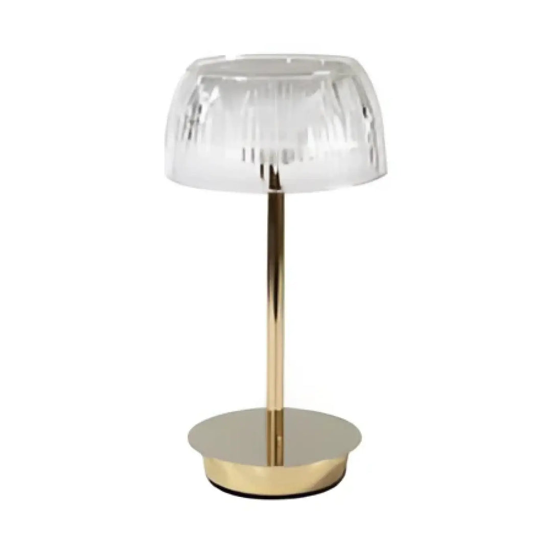 Lampe de table eclatia avec abat-jour en verre facetté transparent sur tige et base circulaire à finition dorée élégante