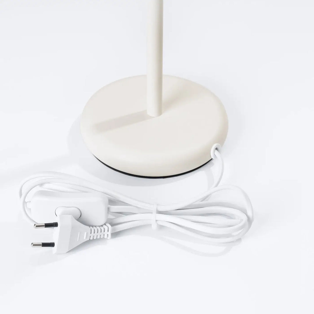 Lampe a poser karbon beige avec base arrondie et tige fine design minimaliste compatible ampoules gu10 interchangeables