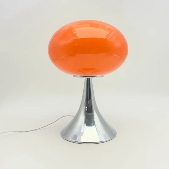 Lampe de table nuacre avec pied chromé et design champignon orange en verre brillant pour un éclairage élégant