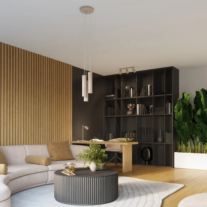 Lampe a poser karbon taupe avec table basse cylindrique gris foncé et design minimaliste à ridges verticales