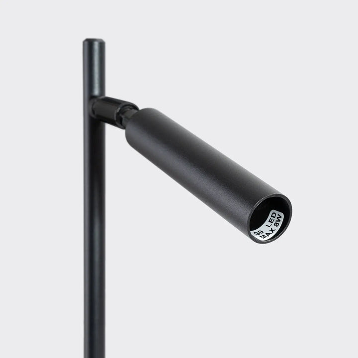 Lampe a poser pastelo noire avec bras ajustable en matériaux robustes pour bureau pastelo moderne et fonctionnel