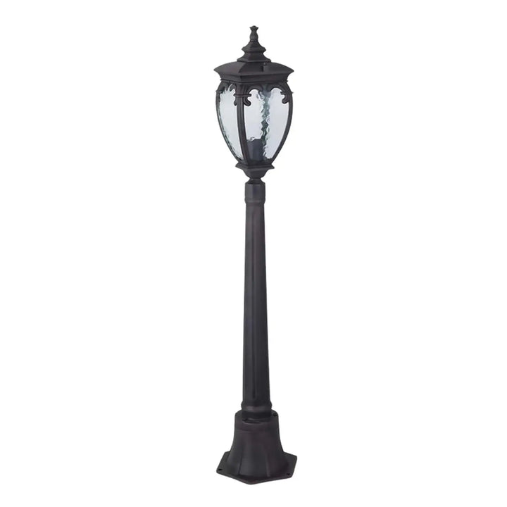 Lampadaire extérieur noir en fer forgé avec lanterne italienne et verre texturé idéal pour long d’une allée ou bord d’une terrasse
