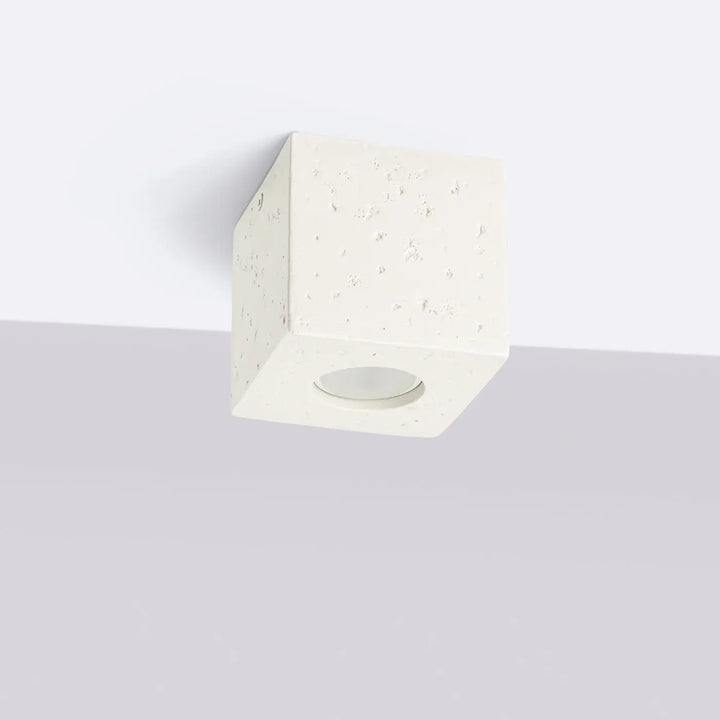Plafonnier quad design contemporain en béton beige texturé avec ouverture circulaire encastrée pour luminaire plafonnier
