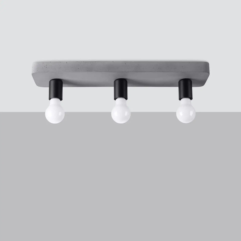 Plafonnier tavo gris béton en béton moderne avec trois douilles noires et ampoules en verre pour une ambiance unique