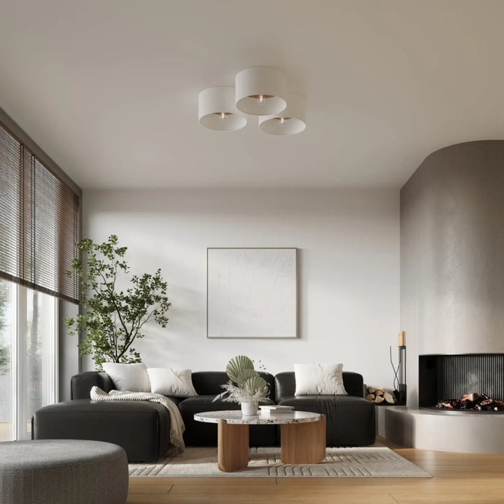 Plafonnier telesto blanc avec trois abat-jours cylindriques et centre métallique pour un design minimaliste parfait