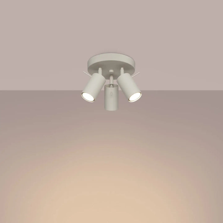 Plafonnier lampe ring beige avec trois projecteurs cylindriques ajustables pour un éclairage flexible minimalisme moderne