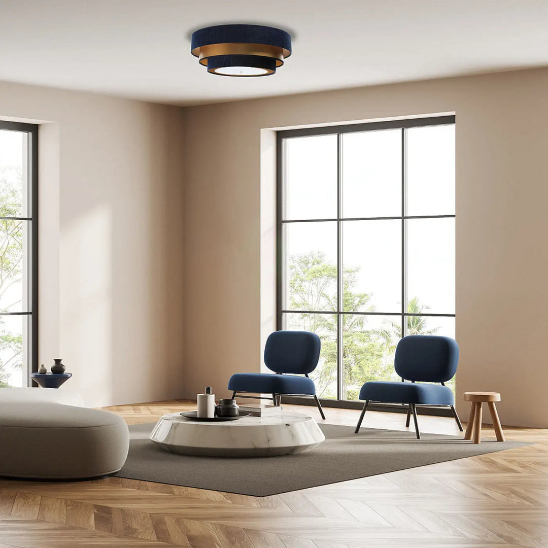 Luminaire plafonnier bleu marine avec anneaux métalliques dorés circulaires design moderne triniti elegant