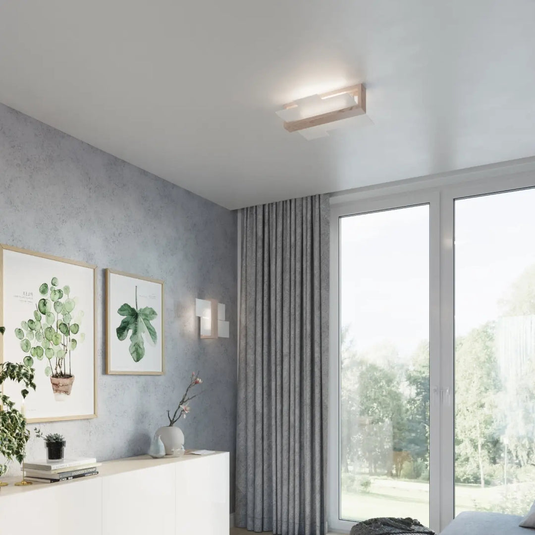 Luminaire plafonnier feniks 2 avec cadre en bois naturel et verre dépoli offrant une atmosphère unique et design intemporel