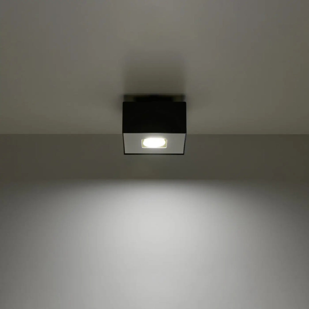 Plafonnier moderne mono noir carré encastré en blanc et noir avec un spot allongé design minimaliste