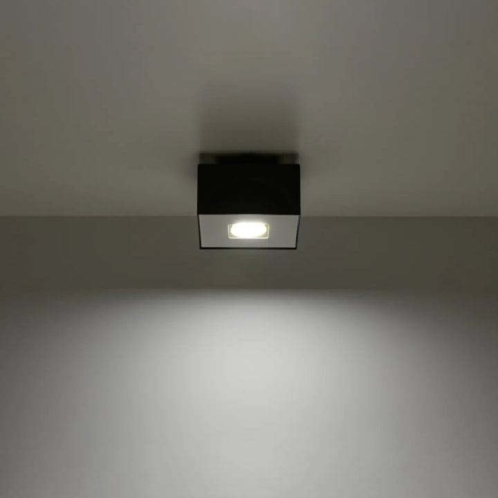 Plafonnier moderne mono noir carré encastré en blanc et noir avec un spot allongé design minimaliste
