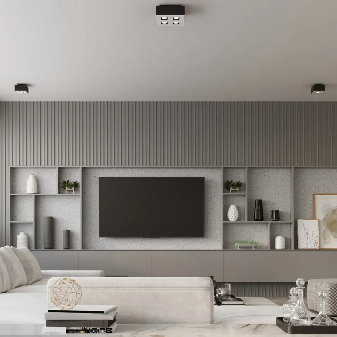 Plafonnier moderne mono noir avec quatre spots allongés intégrés pour un éclairage contemporain