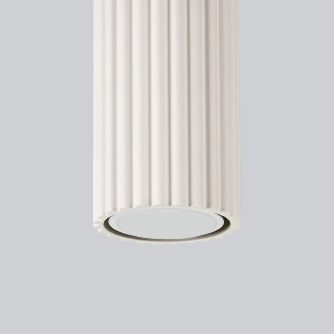 Plafonnier karbon beige en colonne cannelée avec panneau lumineux circulaire et ampoules gu10 interchangeables design minimaliste