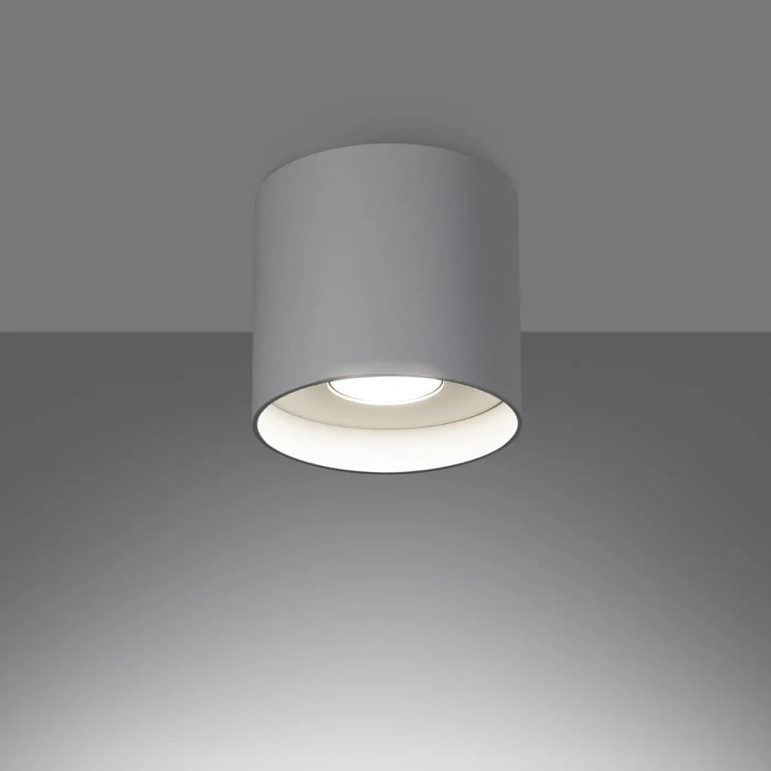 Luminaire plafonnier mika blanc cylindre moderne avec finition mate et base circulaire éclairée idéal plafond mika allie simplicité