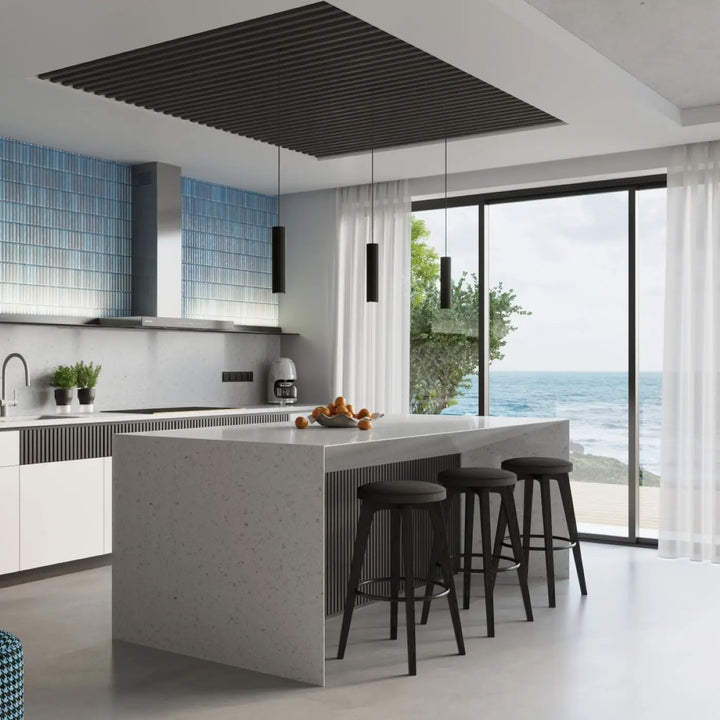 Modern black bar stools with sleek metal frames and cushioned seats complement the plafonnier karbon allie design minimaliste