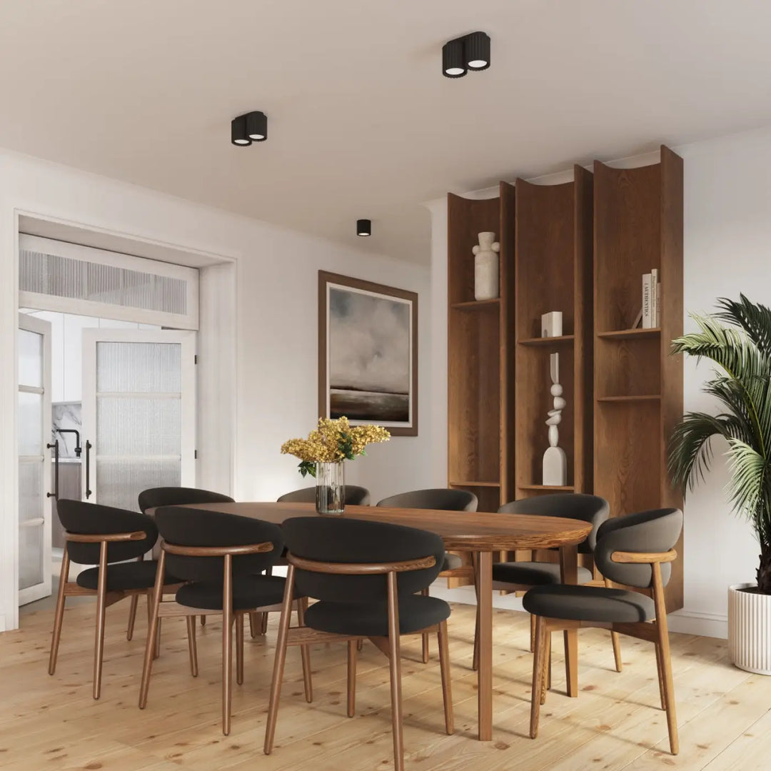 Luminaire plafonnier aura 1 noir avec forme unique inspirée et table à manger en bois clair à finition lisse et bords arrondis