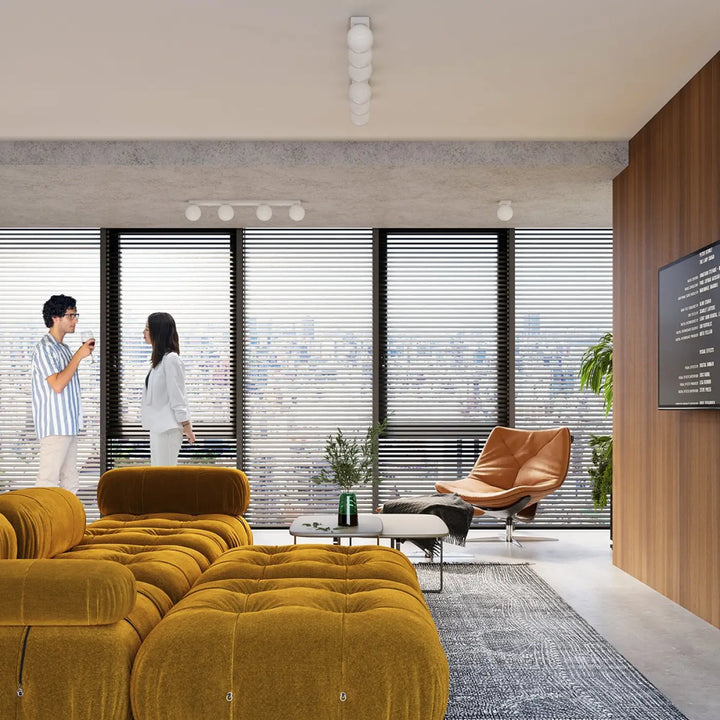 Mustard yellow tufted velvet sectional sofa paired with plafon yoli luminaire plafonnier classe à part part entière