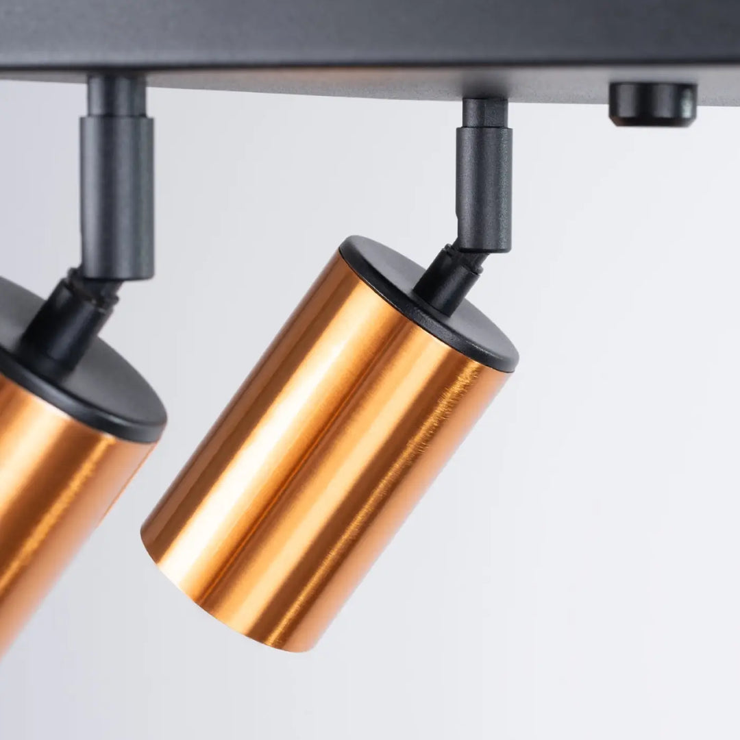 Luminaire plafonnier winx 4 avec lampe winx allie design cuivre et fixation noire en métal cylindrique