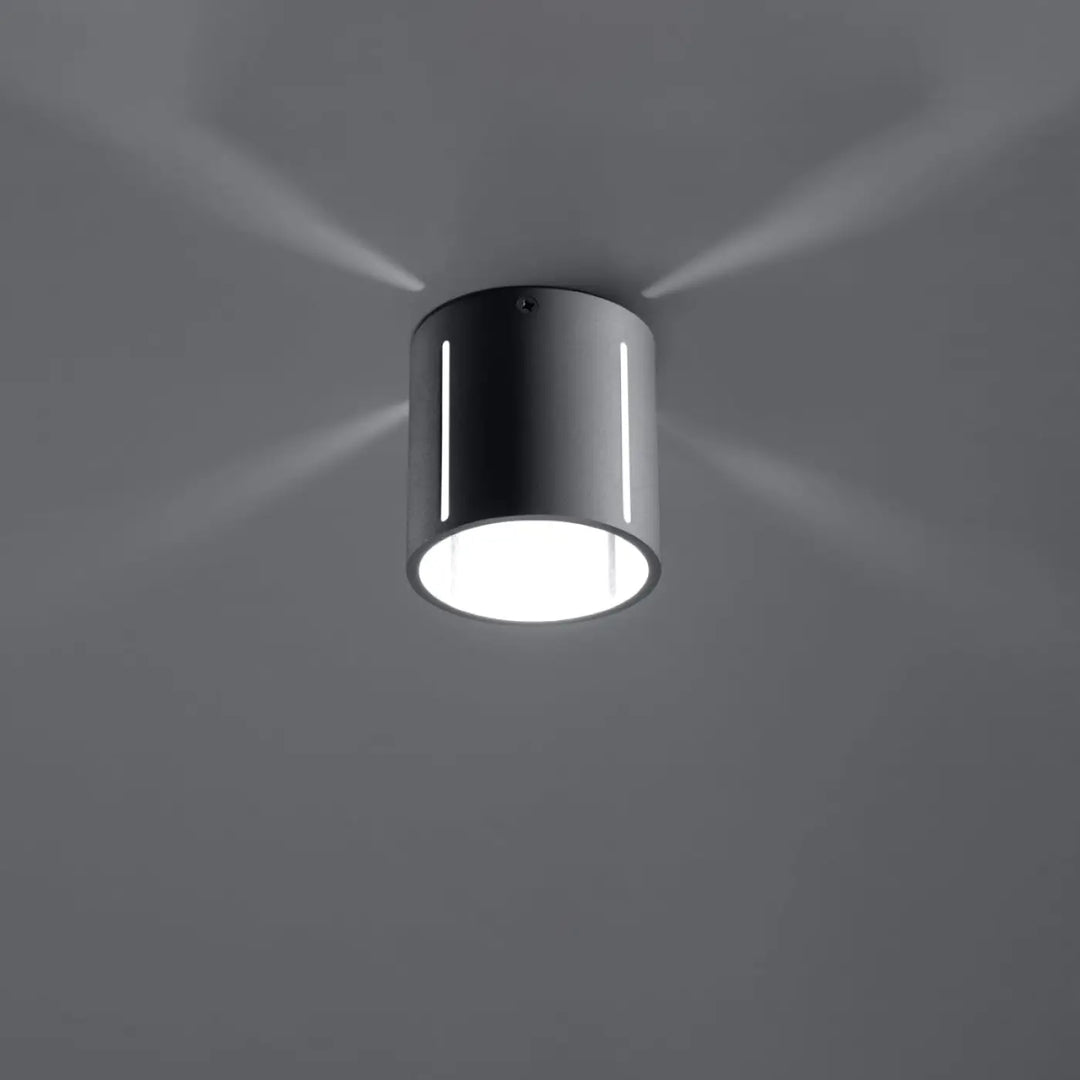 Plafonnier moderne gris cylindrical avec perforation linéaire blanche et spectacle lumineux circulaire éclatant