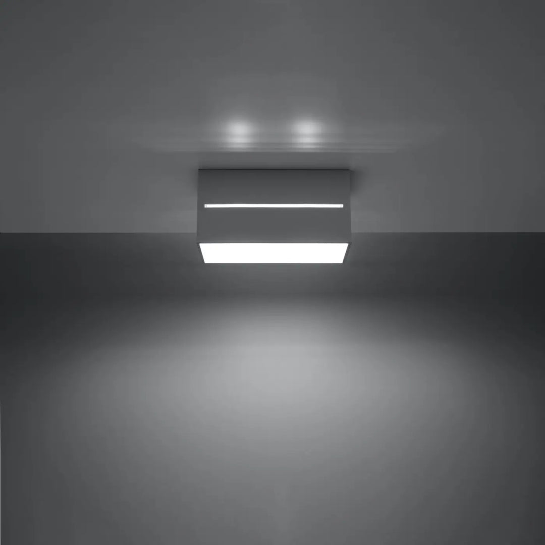 Plafonnier lobo 2 gris moderne avec finition blanche et perforation linéaire pour un spectacle lumineux minimaliste