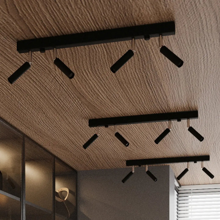 Luminaire plafonnier eyetech 6 noir avec spots orientables style industriel d’ambiance loft sur plafond texturé