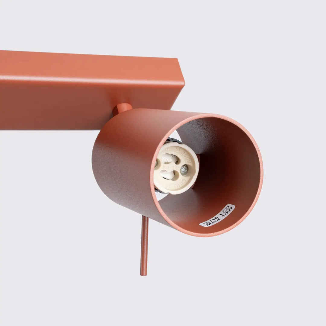 Luminaire plafonnier ring 2 rouge ochra en cuivre avec spot cylindrique et éclairage flexible pour minimalisme moderne