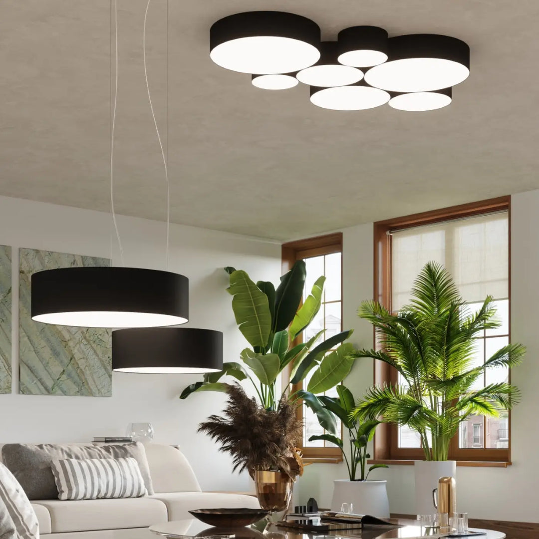 Luminaire plafonnier arena 55 noir avec forme riche et éclairage polyvalent composé de disques circulaires superposés