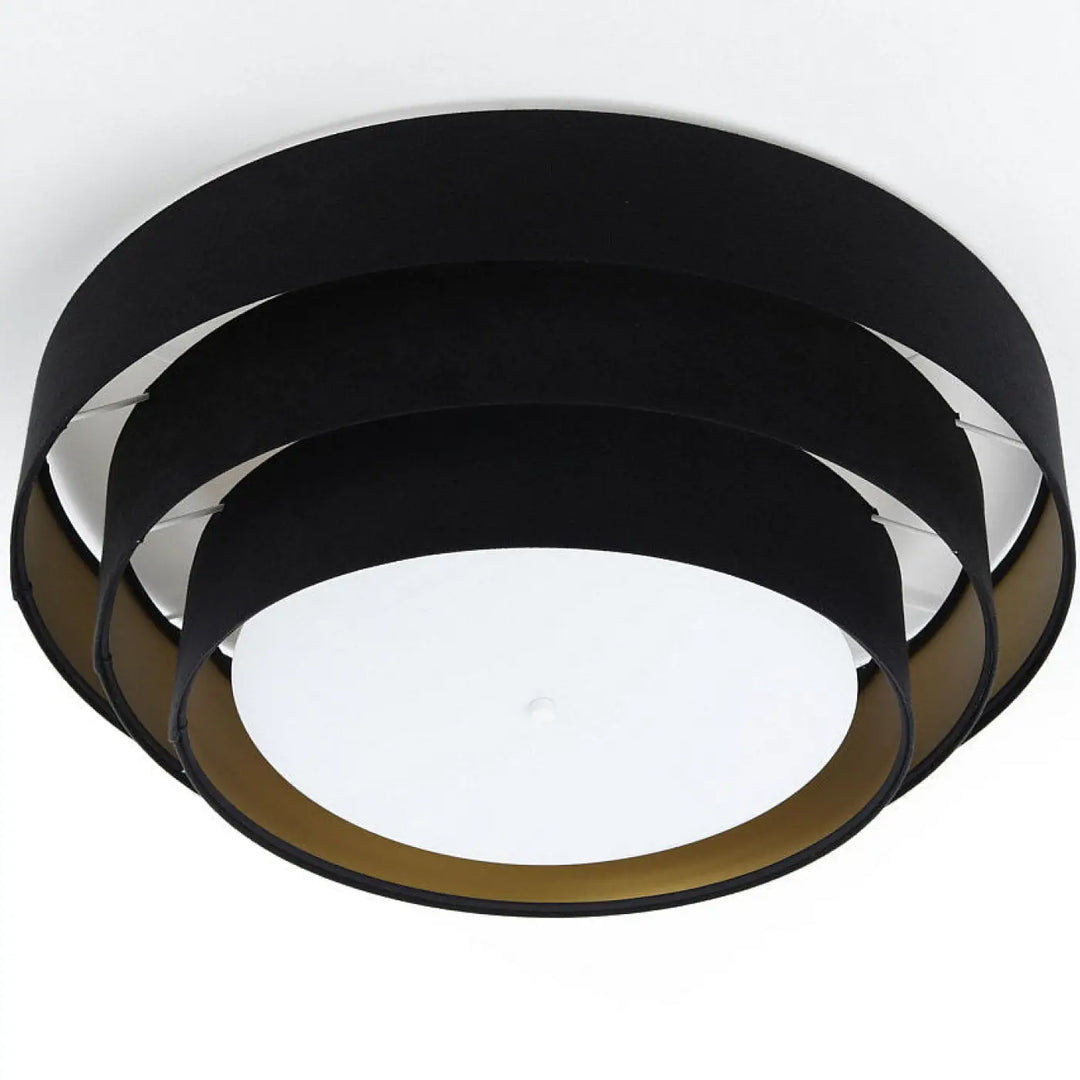 Luminaire plafonnier noir design moderne avec abat-jour en tissu superposés noir et doré concentrique triniti veloursstoff