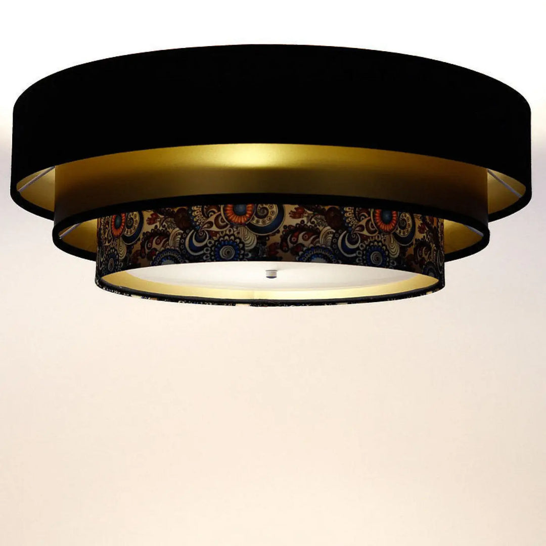 Luminaire plafonnier noir et doré avec anneau central orné de motifs décoratifs multicolores triniti elegant