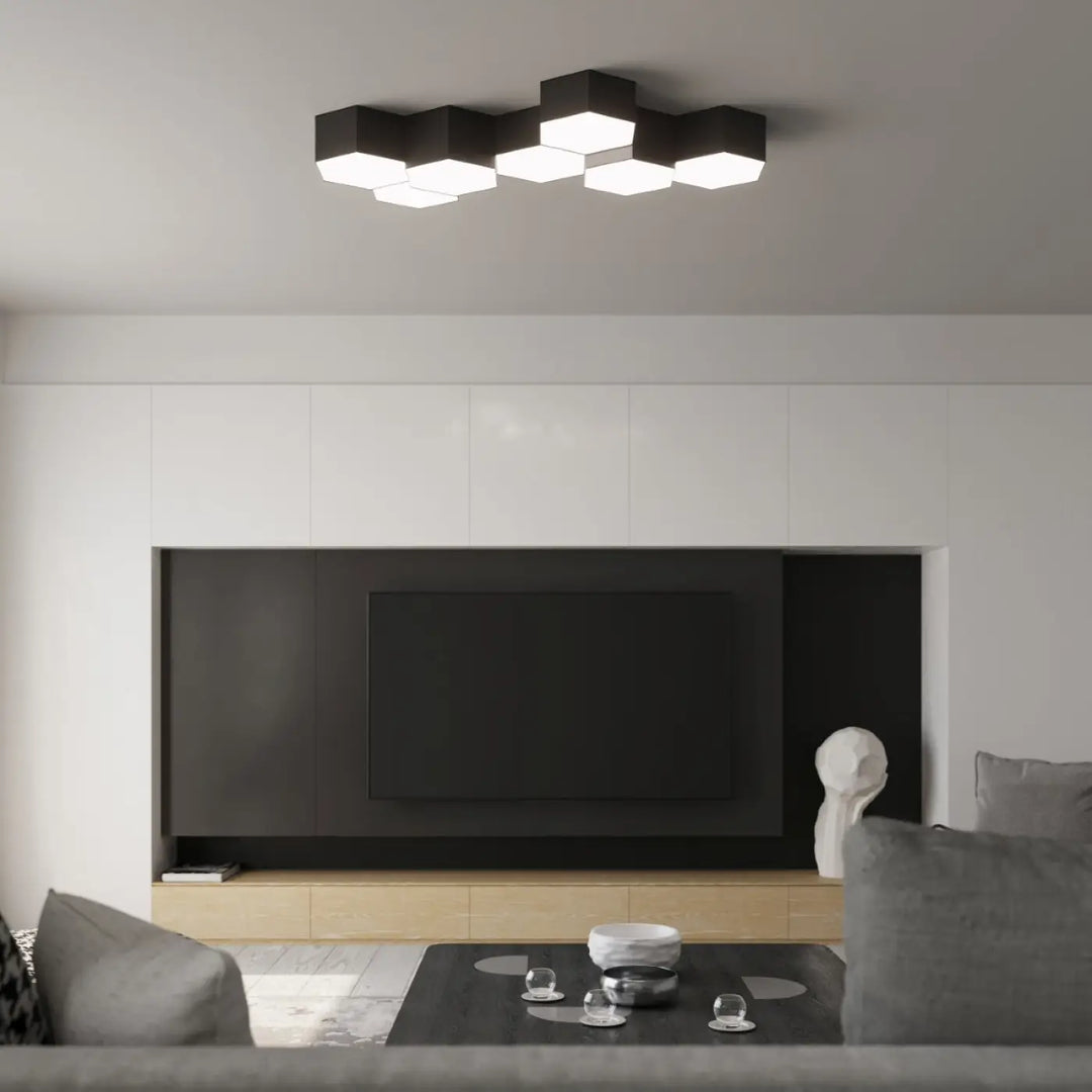 Luminaire plafonnier sunde 11 noir avec formes géométriques hexagonales noires et panneaux lumineux modernes