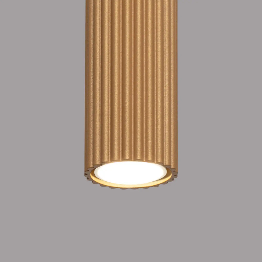 Plafonnier karbon en or à texture cannelée verticale avec ampoules gu10 interchangeables et design minimaliste