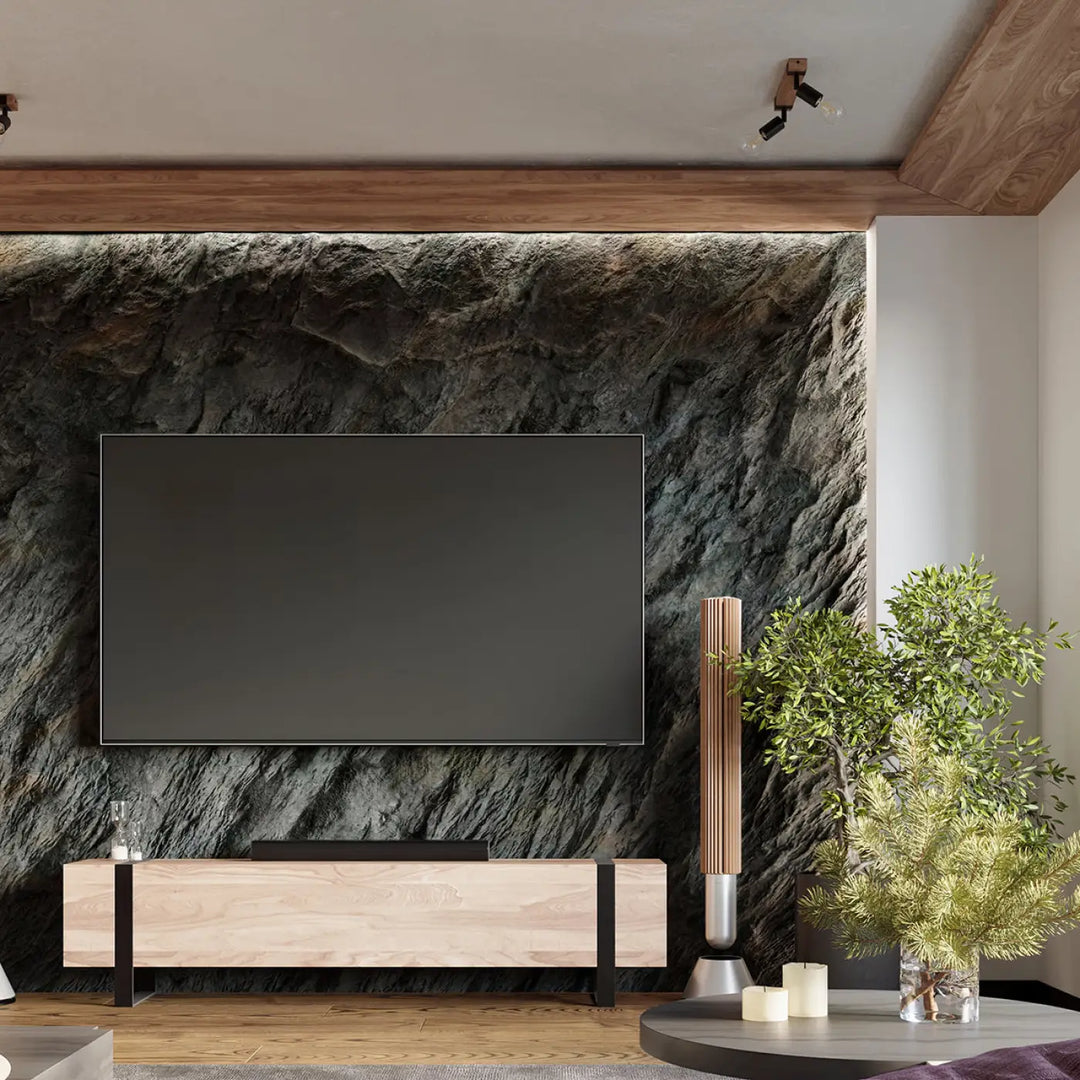 Luminaire plafonnier zuca 4 noir avec ampoules décoratives visibles monté sur mur en pierre texturée avec console bois minimaliste