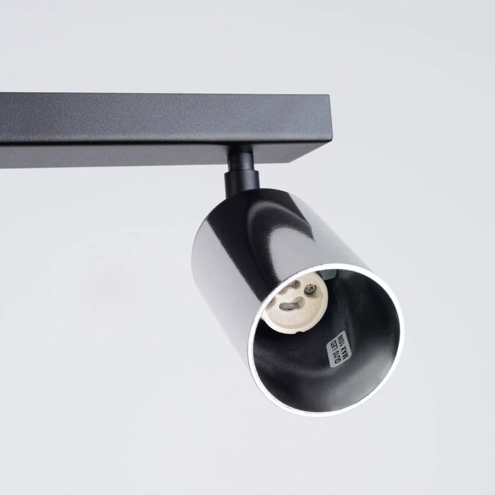 Luminaire plafonnier winx 4l noir avec corps cylindrique mat et douille e27 visible pour lampe winx allie