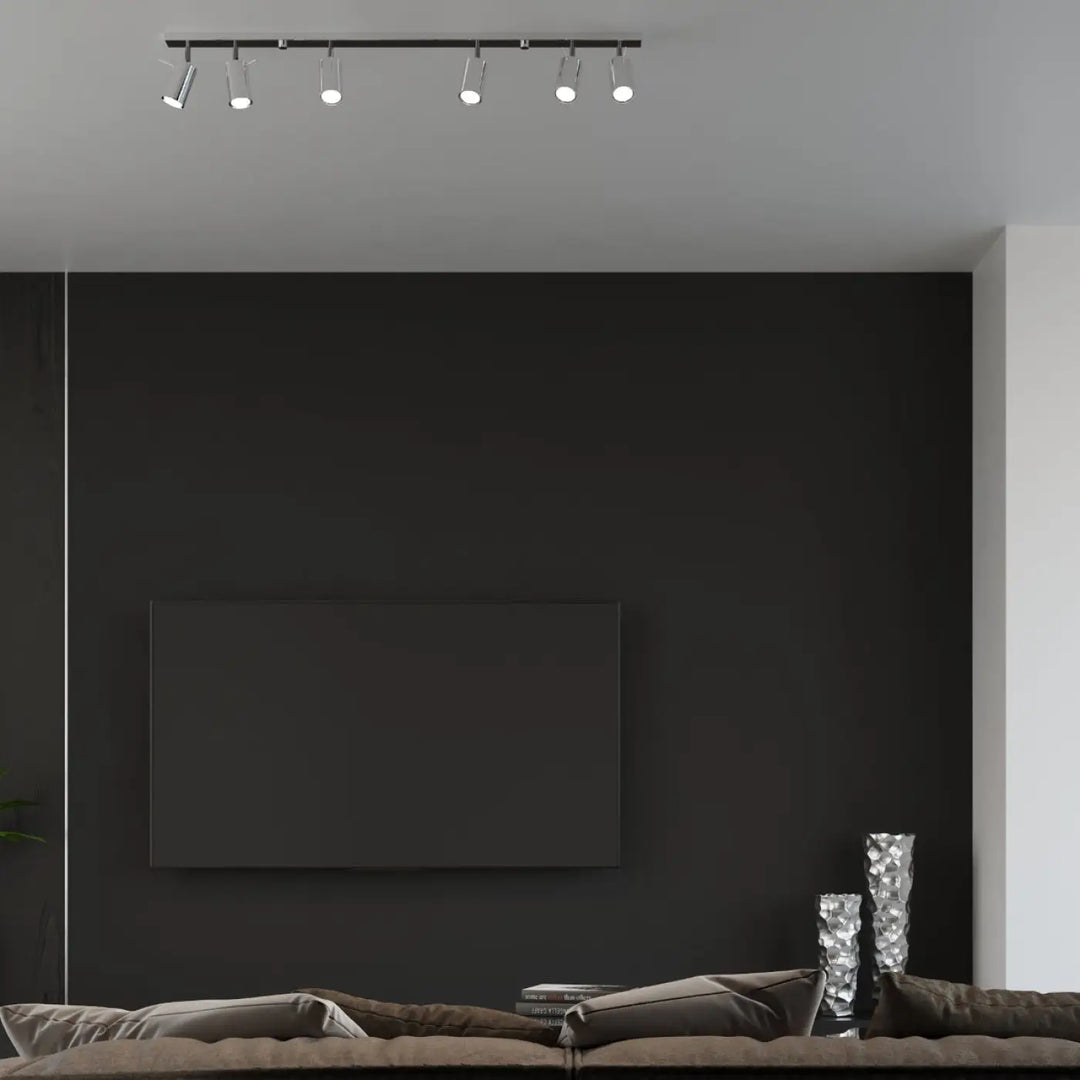 Luminaire plafonnier chrome ring 4l avec cinq spots réglables noir pour une ambiance intérieure en demi-obscurité chaleureuse